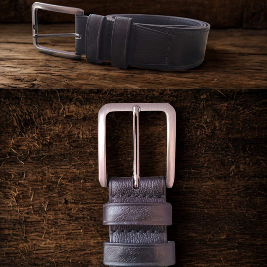 A close-up of a luxury Handmade Pebbled Leather Belt for Men by SECOLO, showing the rich pebbled texture and polished silver-tone buckle.
