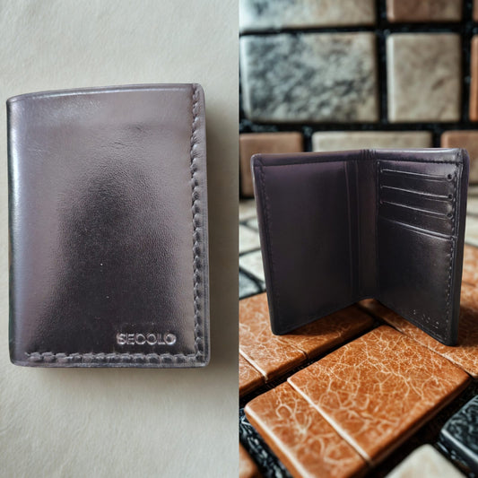 A luxury Handmade Vertical Genuine Leather Wallet by SECOLO in dark brown, featuring a smooth finish, vertical card slots, and artisanal hand-stitching.